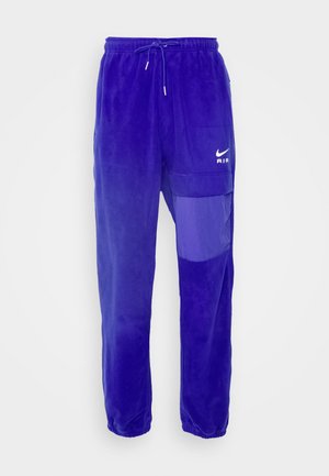 Nike Sportswear AIR WINTER PANT - Cargo trousers - deep royal blue/white