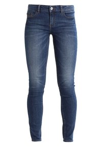 Jeans de denim ajustados de color azul con cierre frontal de botón y cremallera, estilo de cinco bolsillos, y un ligero desgastado en los muslos y las rodillas.