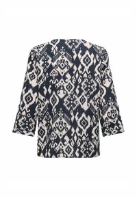 Marineblaues Oberteil mit einem cremefarbenen Ikat-Muster, Dreiviertelärmel, runder Ausschnitt und lässiger Passform, hergestellt aus einem strukturierten Stoff.