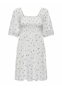 Valge kleit nelinurkse kaelusega, lühikeste puhvärvlitega ja smockitud bodice'iga. Kaunistatud väikeste mustade südamekestega, mis on juhuslikult jaotatud.