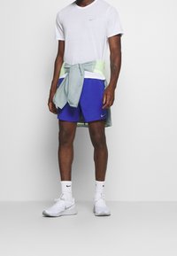 Nike Performance Träningsshorts - blue
