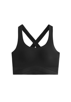 Top sportivo nero con spalline incrociate, texture liscia e una fascia ampia con motivo a forma di chevron nella parte inferiore.