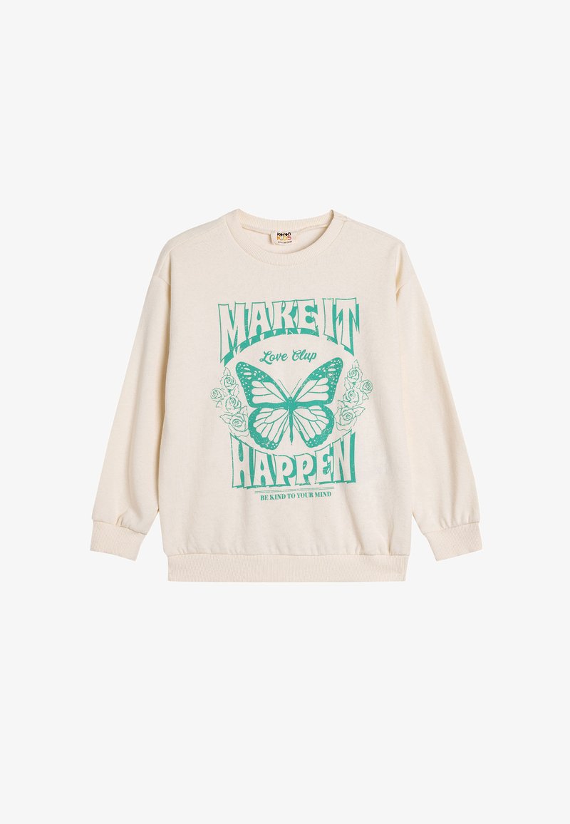 Sudadera crema con un gráfico de mariposa verde, "HAZ QUE SUCEDA" y acentos florales. Cuenta con mangas largas y puños y dobladillo acanalados.