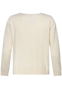 Pull crème à manches longues, avec un large col rond, un ourlet côtelé et une texture lisse. Design basique, sans motifs ni embellissements.