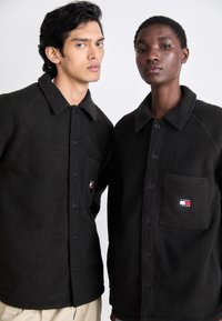 Tommy Jeans UNISEX czarny