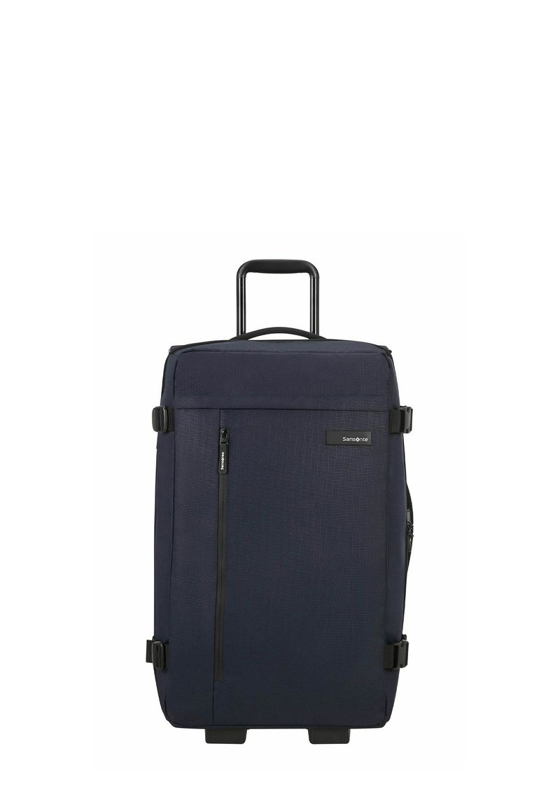 Valise à roulettes bleu marine foncé avec un tissu texturé, un grand compartiment principal, une poignée robuste et une poche frontale zippée. Roues durables incluses.