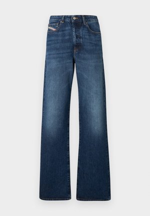 Weit geschnittene Jeans aus dunkelblauem Denim, mit hoher Taille, fünf Taschen und kontrastierenden Nähten entlang der Nähte.