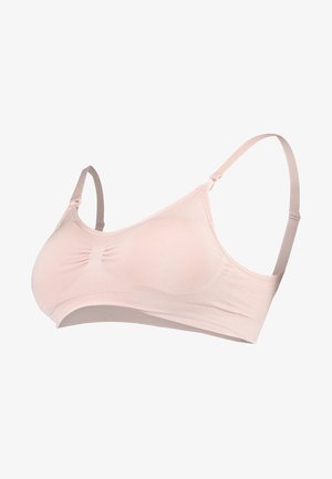 Sutiã ligeiramente rosa, sem costuras, feito de um tecido suave, com um centro franzido, alças ajustáveis e um acabamento liso. Sem aros ou almofadas.