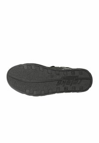 Sole di scarpa in gomma nera con motivo di presa texturizzato e scanalature profonde. Presenta un logo e una finitura liscia per una maggiore durata.