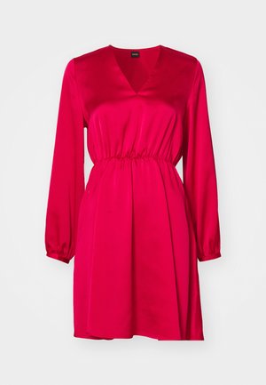 V-neck, long-sleeve dress in bright pink satin with an elastic waist, flowing skirt, and gathered sleeve cuffs. Smooth texture, minimal details.