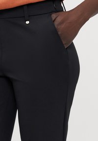 ONLY Tall ONLPEACH LIFE FLARED  - Trousers - black