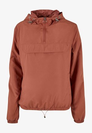 Red, lightweight, windbreaker jacket featuring a half-zip front, adjustable hood with drawstrings, and elasticated hem and cuffs.