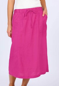 Pink linen skirt with a drawstring waist and side pockets, featuring a straight cut, smooth texture, and knee-length design.