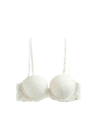 Witte kanten bh met gevormde cups, verstelbare bandjes, geschulpte randen en een delicate bloemenpatroon langs de onderkant.