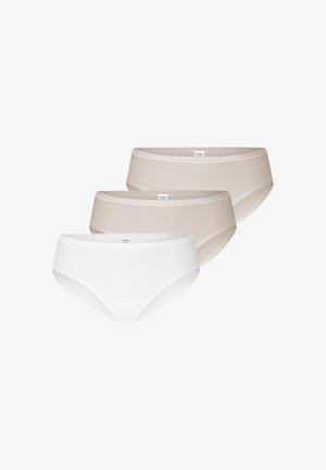 Tre slip senza cuciture da donna nei toni del bianco e beige, disposti sovrapposti su uno sfondo bianco.