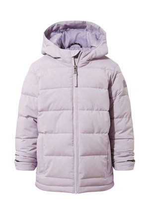 Child wearing a light gray puffer jacket, beige knit hat, black jeans, and pink hiking boots standing with hands clasped, looking slightly to the side.