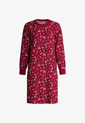 Red dress featuring long sleeves and a round neckline, adorned with a festive pattern of nutcrackers, candy canes, and holiday motifs.