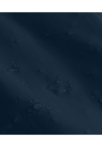 Navy blue fabric with a smooth texture, featuring water droplets scattered across the surface, indicating water resistance.
