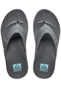 Gray flip flops with textured rubber soles and a patterned fabric strap. Features a blue "REEF" logo on each footbed.