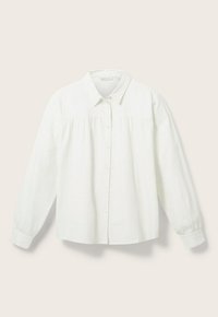Camicia bianca con colletto, maniche lunghe e dettaglio arricciato sul davanti. Realizzata in un tessuto testurizzato con un motivo sottile.