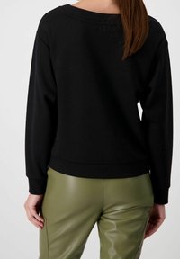 Monari Sudadera - black
