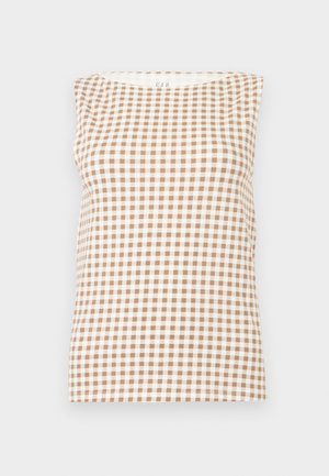 Ujjatlan, bézs és fehér kockás felső kerek nyakkivágással, világosszürke háttéren laposan elrendezve.