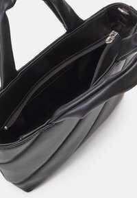 Calvin Klein Jeans MICRO TOTE  - Borsa a mano - black