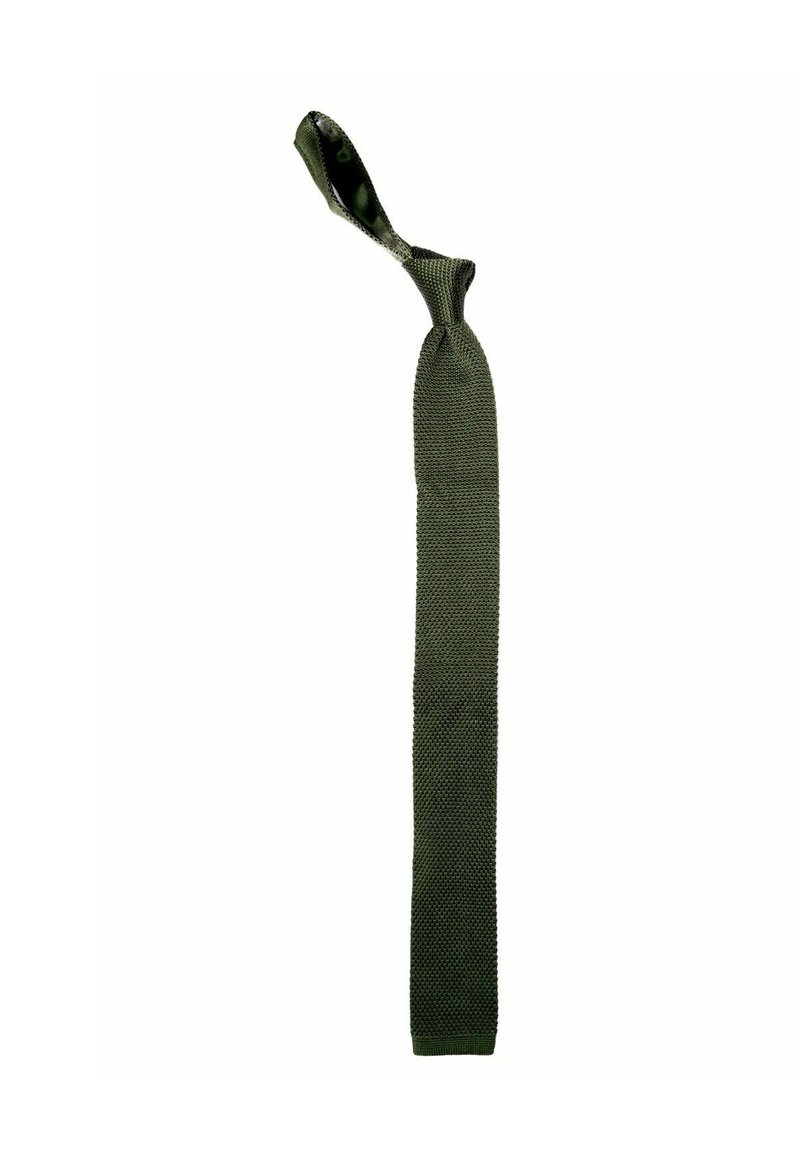 Stickad slips i mörkgrön färg med ett texturerat mönster. Slipsen har en avsmalnande ände och en ögla för säker fastsättning.