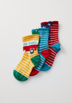 Set di tre paia di calzini per bambini: gialli con strisce rosse e blu, blu con strisce verdi e rossi con strisce bianche. Materiale in maglia morbida.