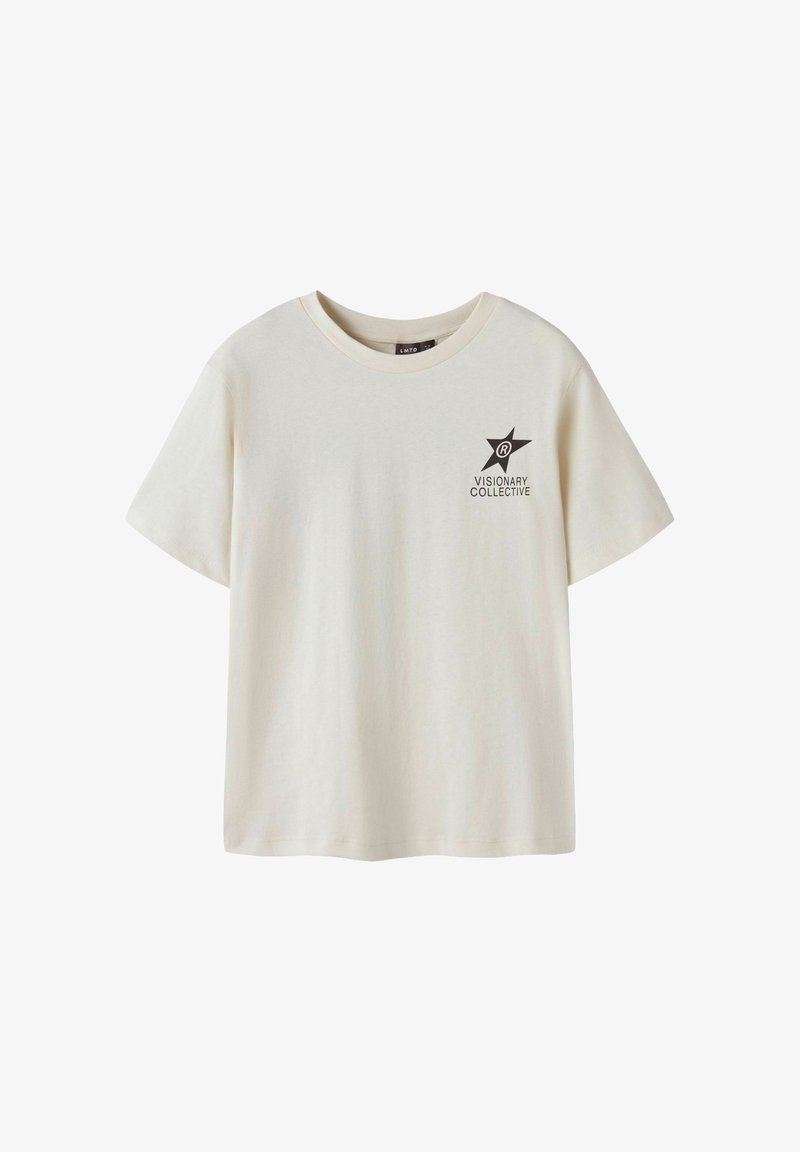 Camiseta de algodón beige de manga corta con un gráfico de estrella negra y el texto "VISIONARY COLLECTIVE" en el área del pecho izquierdo.
