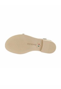 Suola beige con motivo testurizzato, caratterizzata da costole e scanalature per aderenza. Contrassegnata con "Made in Italy" e taglia 37. Design piatto.