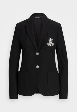 Zwarte blazer met geborduurd logo, twee zilveren knopen, notch revers en twee voorzakken. Gestructureerde stof met een getailleerde pasvorm.