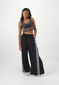 adidas Originals Tracksuit bottoms - black