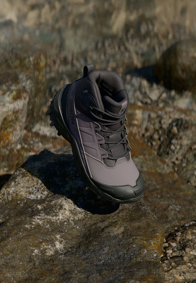 Matkajalatsid halli ja musta disainiga, sünteetilisest materjalist, robustne tald selgete haardelõikedega ja pehmendusega ankle tugi.