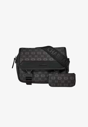 Sac bandoulière en tissu noir à motifs avec sangle ajustable et petite pochette zippée assortie à l’avant.