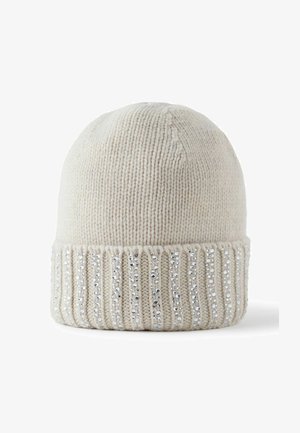 Strikket beige hue med en ribbet kant dekoreret med sølvpalietter. Blød tekstur, rund top og tætsiddende pasform.