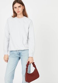 LANCASTER SMALL BASIC CHOUCHOU - Sac à main - carmin