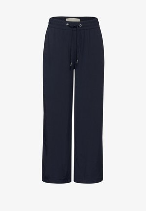 Pantalones de pierna ancha azul marino hechos de una tela suave; cuentan con una cinturilla elástica con cordón y puntas de metal; textura suave, sin patrones.