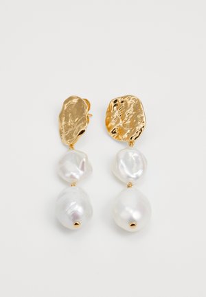Gold-tone metal earrings featuring organic-shaped accents, with three lustrous, irregular freshwater pearls in white hues.