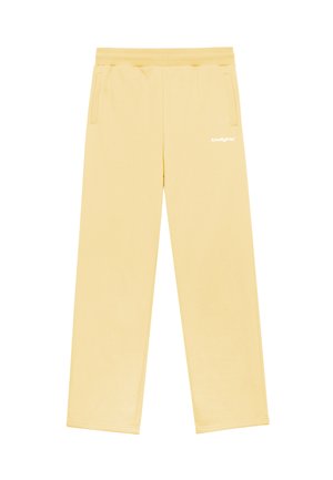 Yellow cotton sweatpants with a relaxed fit, featuring side pockets and a small white logo on the left leg. Smooth texture and simple design.