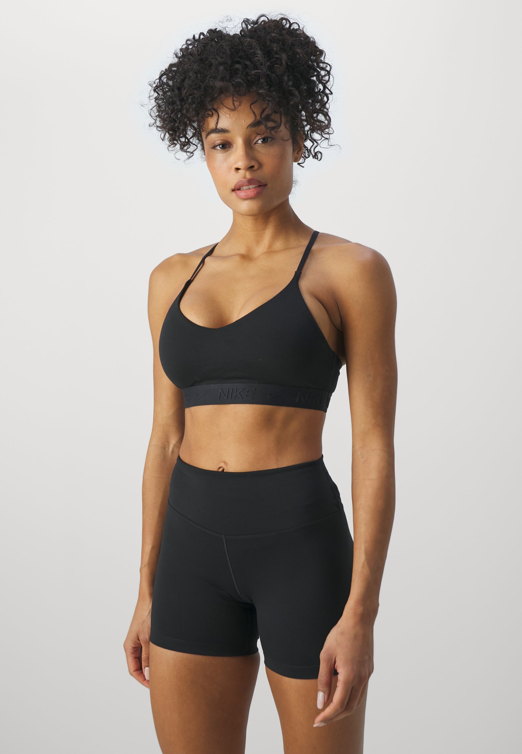 INDY BRA - Reggiseno sportivo con sostegno leggero - black donna