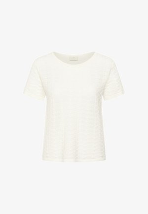 Haut blanc en tricot à manches courtes avec un col rond et un motif texturé subtil sur tout le tissu.
