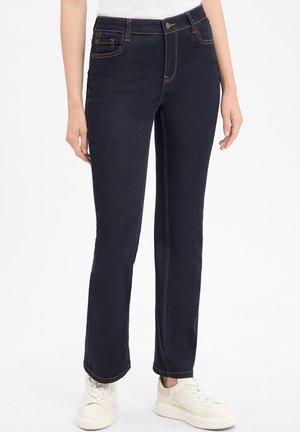- Jeansy Slim Fit