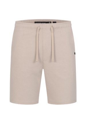 Beżowe bawełniane szorty z elastycznym paskiem na gumkę i sznurkiem, bocznymi kieszeniami oraz małą naszywką z logo na lewej nogawce. Gładka faktura.