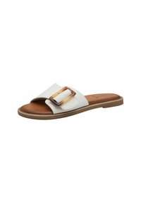 White slide sandal with a wide strap, featuring a large rectangular brown and cream buckle, brown insole, and tan rubber sole with beaded trim.