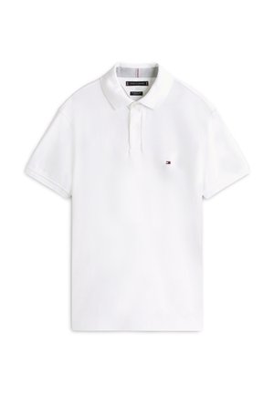 White short-sleeve polo shirt with a collar, two buttons, and a small Tommy Hilfiger flag logo on the left chest.