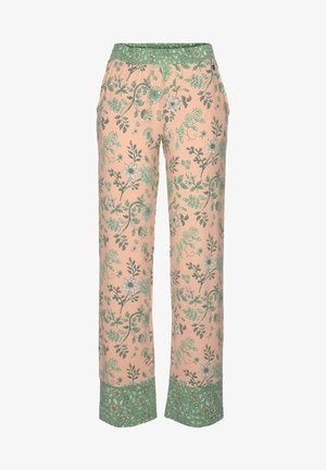 Light pink pants with a floral print in green. Elastic waistband and green floral border at the cuffs. Soft fabric and loose fit.
