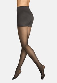 Schwarze blickdichte Strumpfhosen mit glatter Textur und hohem Bund, ausgestattet mit einem durchsichtigen Beinteil, das von undurchsichtig zu transparent übergeht.