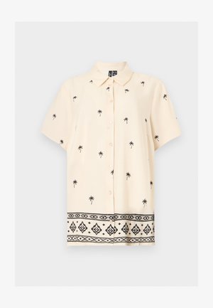 Κρεμ πουκάμισο με κοντά μανίκια και κουμπιά, με μαύρο σχέδιο φοίνικα και γεωμετρικό περιμετρικό μοτίβο στο τελείωμα.