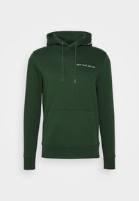 Dark green hoodie made of cotton blend, featuring a front pocket, adjustable drawstrings, and white text "NEW YORK, EST. 1985" on chest.
